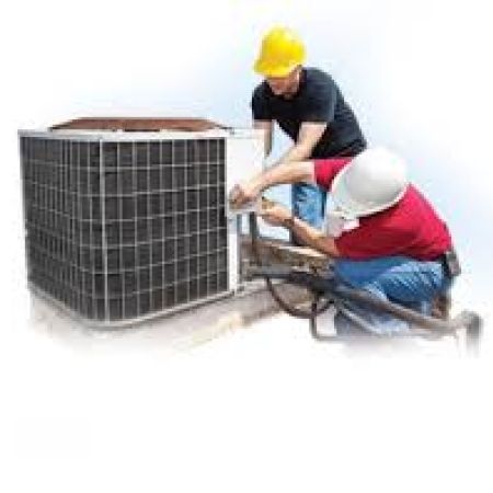 2 HVAC Installers working on an air conditioning unit